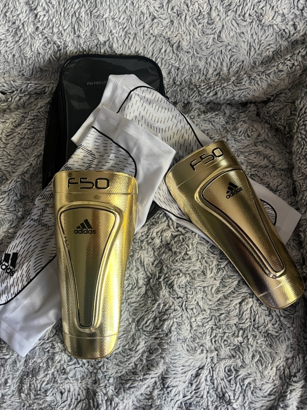 adidas Gold and Black F50 Pro-Lite Messi Shin Guards with Case